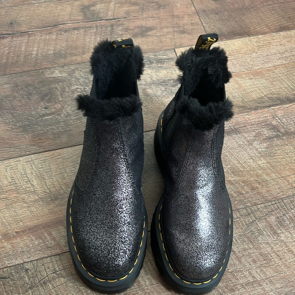 Dr. Marten black glitter platform fuzzy interior boots.